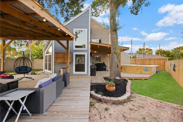 a view of a chairs and table in a patio