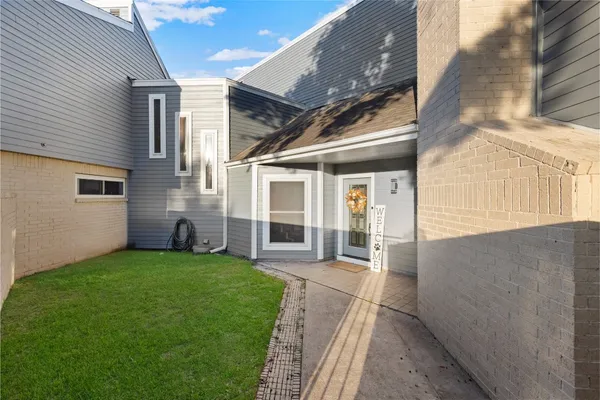 a view of a house with a porch