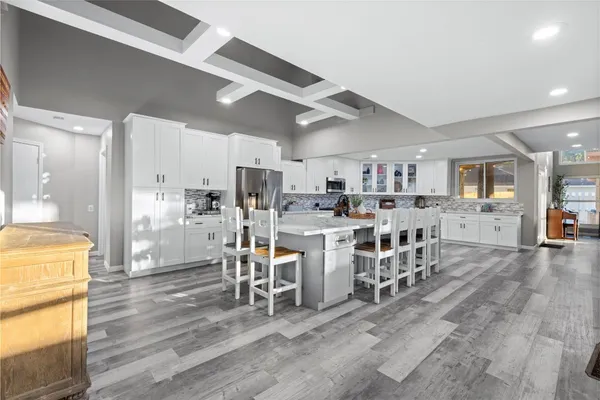 a view of a dining room kitchen and a window