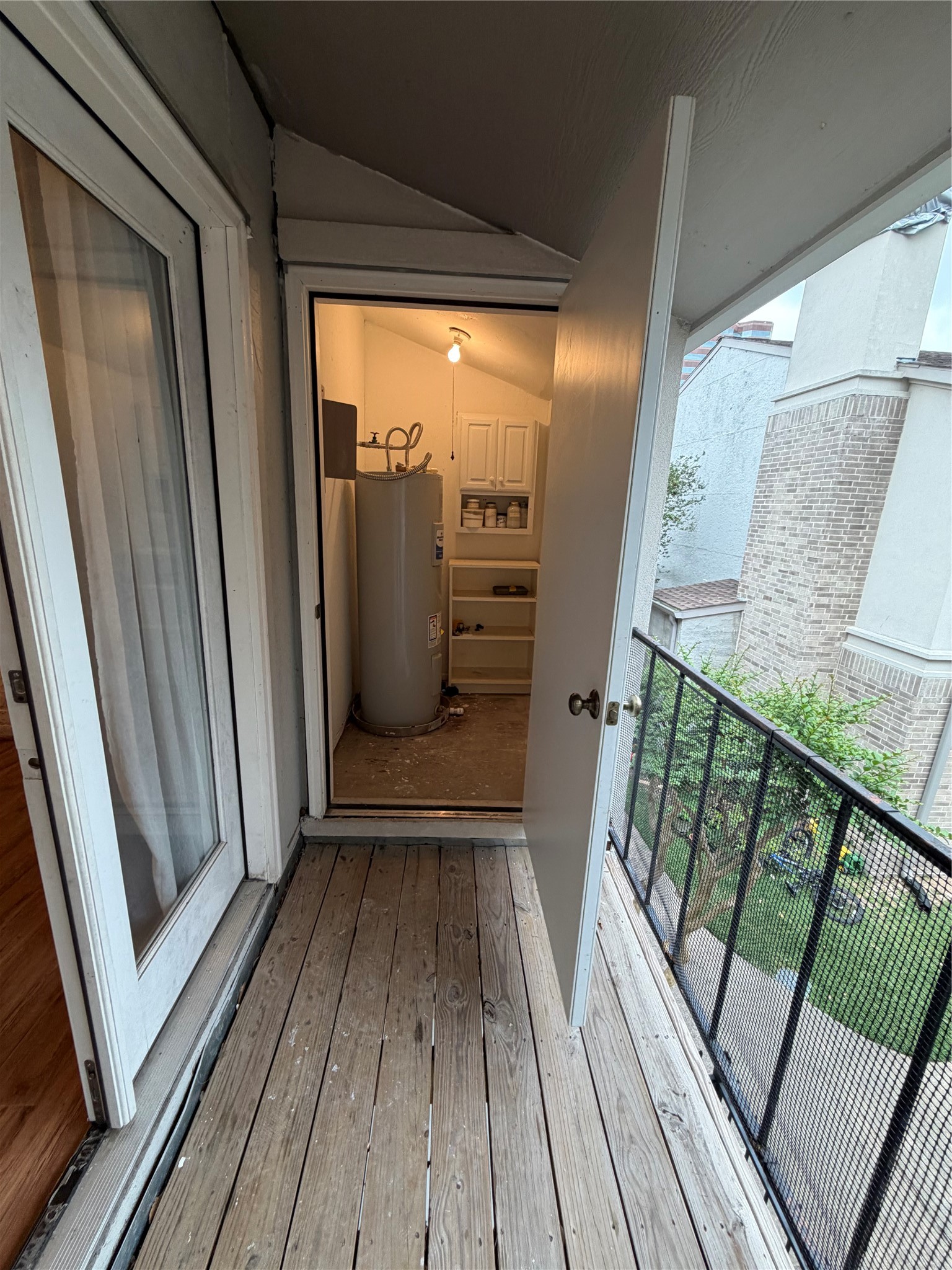 2425 Augusta Drive, Unit 36 Houston, TX 77057 - Photo 9 of 24 a view of a balcony with wooden floor