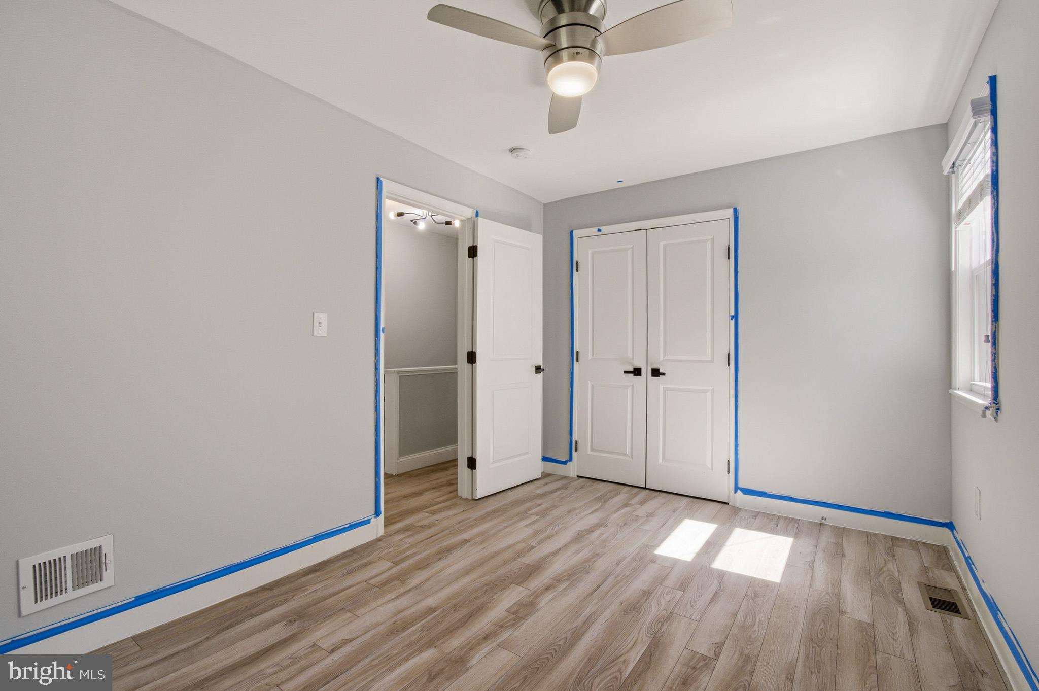 1527 Morris Road Southeast Washington, DC 20020 - Photo 17 of 22 a view of an empty room with wooden floor