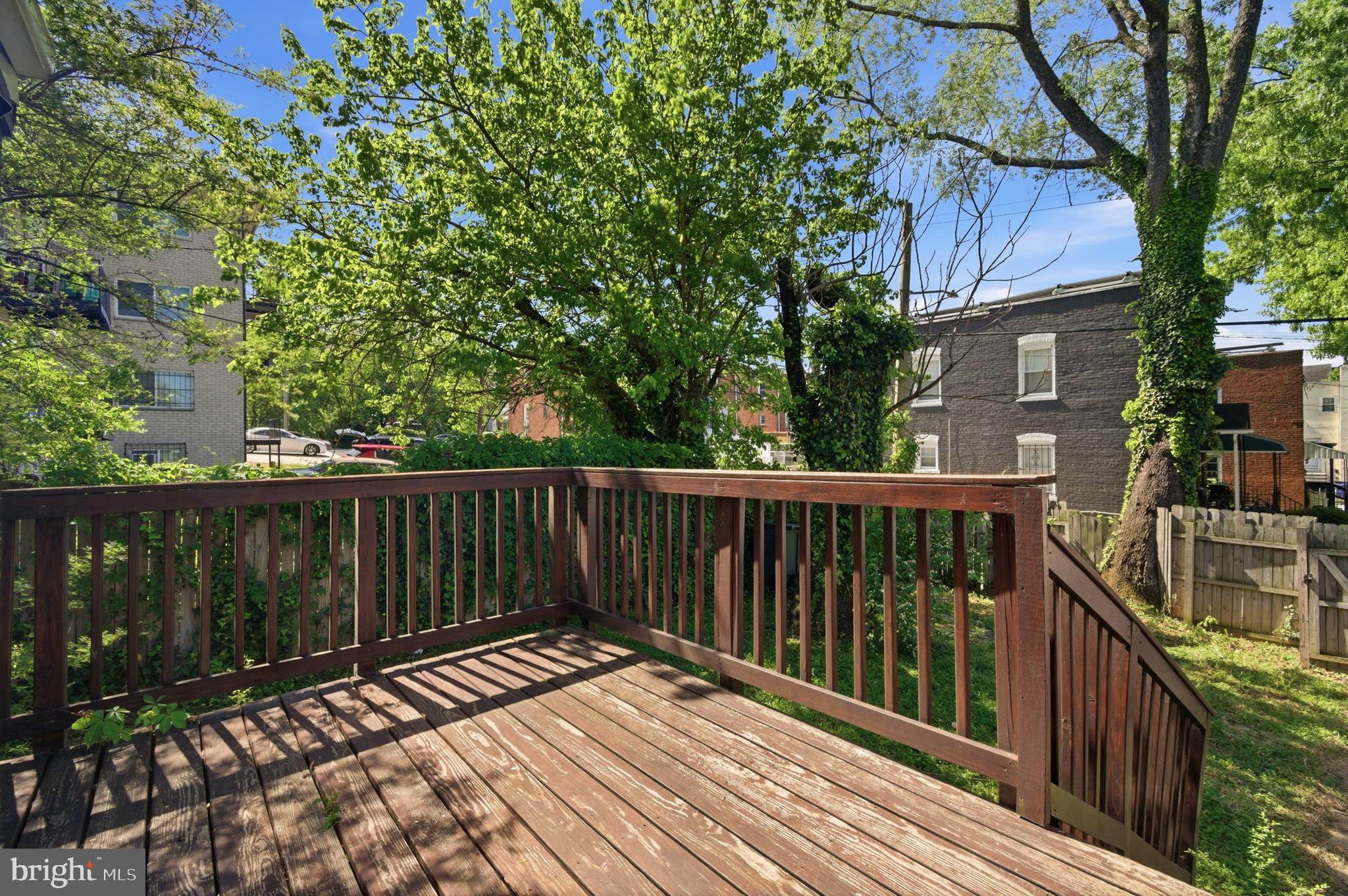 1527 Morris Road Southeast Washington, DC 20020 - Photo 21 of 22 a view of balcony with wooden floor and fence