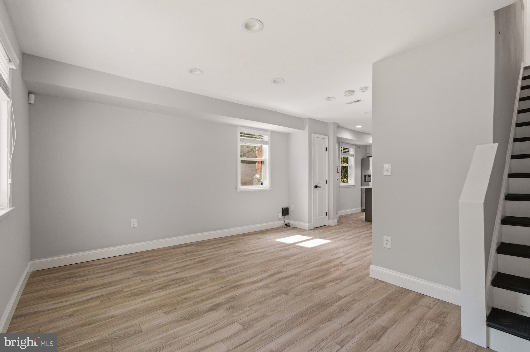 1527 Morris Road Southeast Washington, DC 20020 - Photo 3 of 22 wooden floor in an empty room