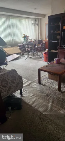 a view of livingroom with furniture and window