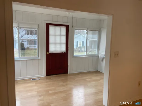 an empty room with windows