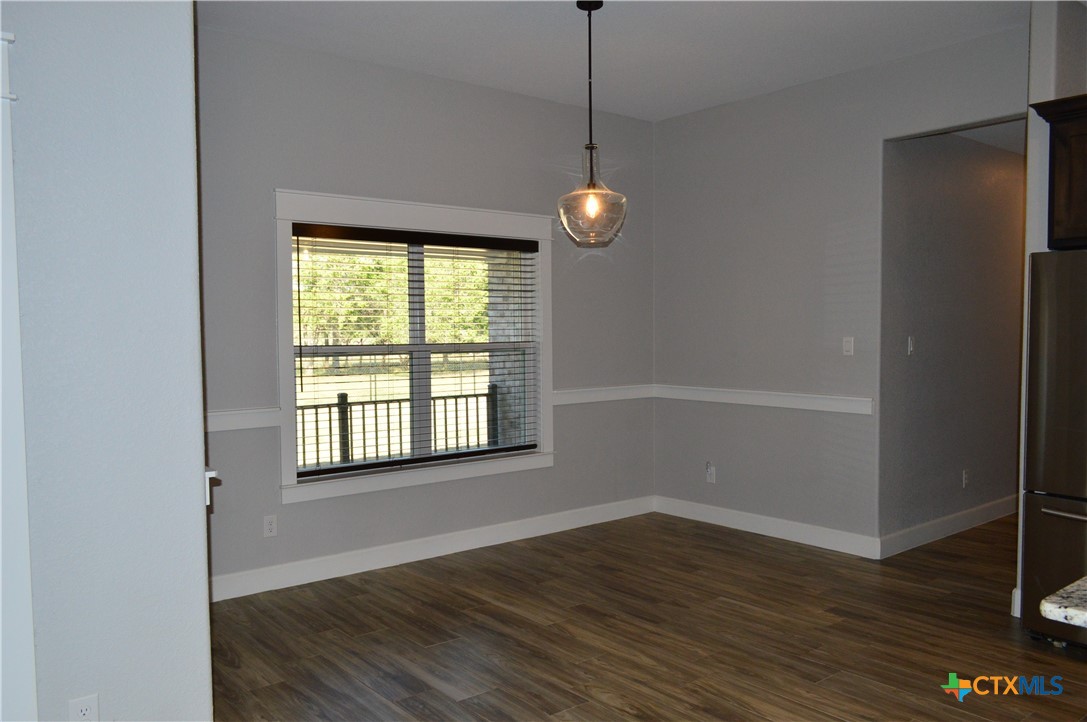 1026 County Road 3152 Kempner, TX 76539 - Photo 12 of 48 Everyday Dining Area by the Kitchen * Wood Look Tile Flooring