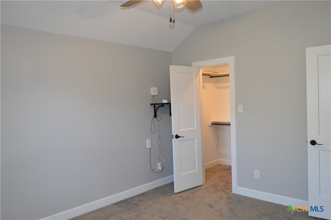 1026 County Road 3152 Kempner, TX 76539 - Photo 27 of 48 Bedroom Four with High Ceiling, Ceiling Fan, and Walk-in Closet