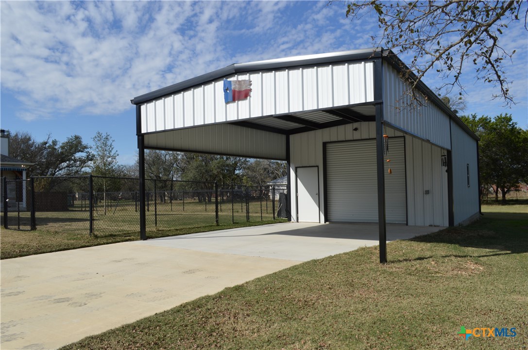 1026 County Road 3152 Kempner, TX 76539 - Photo 31 of 48 20' X 30' Shop with Electricity, Walk-in Door, and Drive Through Garage Doors on Front and Back * Attached 20' X 25' Carport