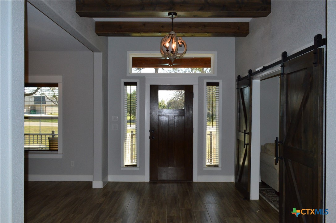 1026 County Road 3152 Kempner, TX 76539 - Photo 45 of 48 Elegant Front Entry/Foyer ** Open Floor Plan ** Wood-Look Tile Flooring * Barn Doors to the Den/Office