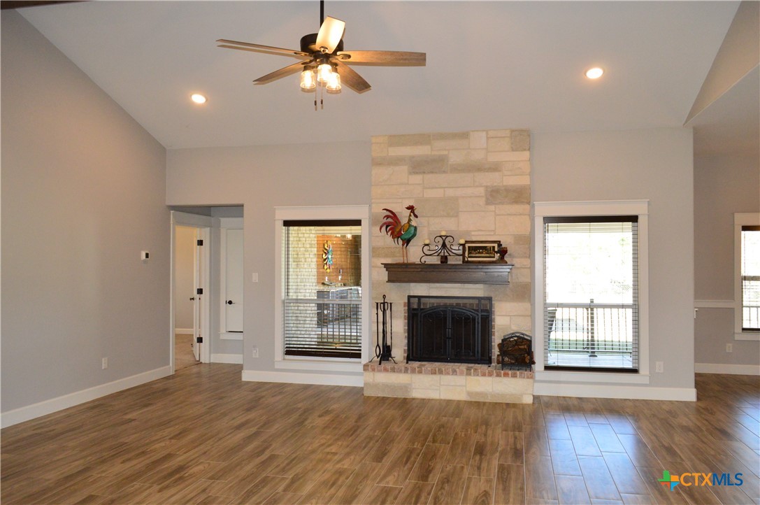 1026 County Road 3152 Kempner, TX 76539 - Photo 5 of 48 Cozy Wood Burning Fireplace with Mantle and Raised Hearth ** Wood Blinds Throughout