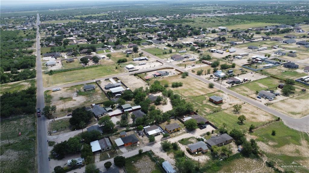 418 Hawk Street Sullivan City, TX 78595 - Photo 7 of 12 an aerial view of a city with lots of residential buildings