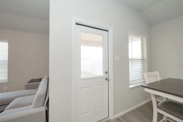 a view of a livingroom with furniture and window