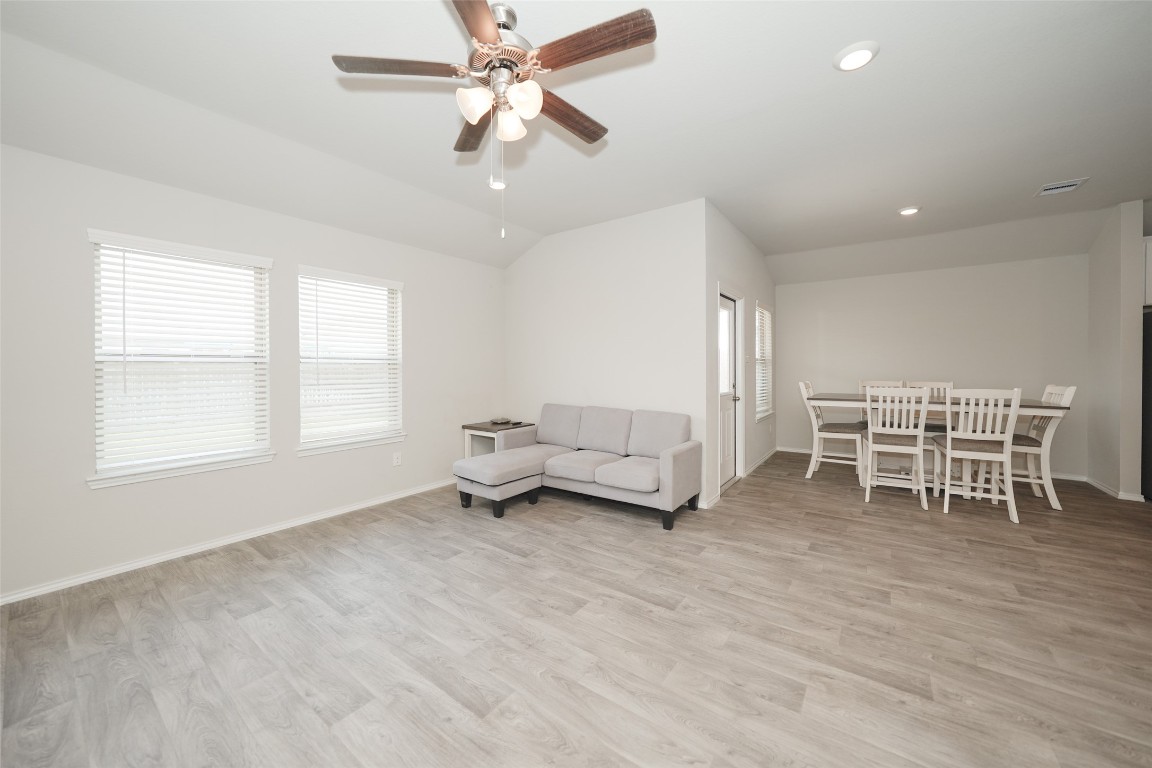 2407 Divot Lane Navasota, TX 77868 - Photo 20 of 37 a living room with furniture and a large window