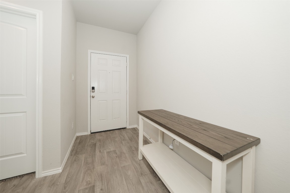 2407 Divot Lane Navasota, TX 77868 - Photo 2 of 37 a view of wooden floor