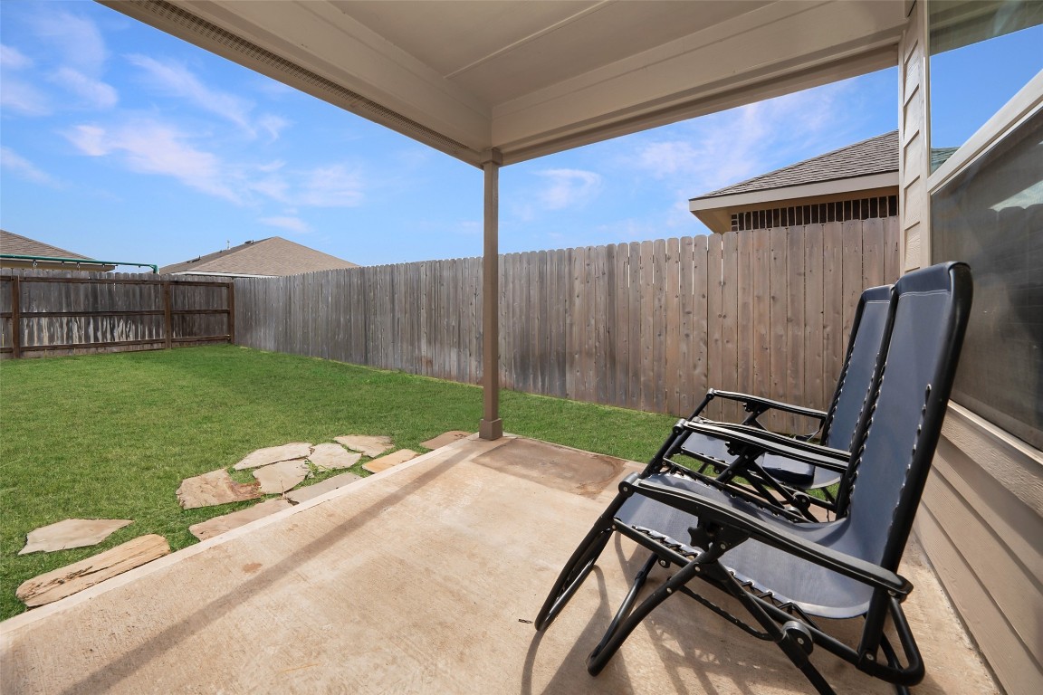 2407 Divot Lane Navasota, TX 77868 - Photo 37 of 37 a view of a backyard with sitting area