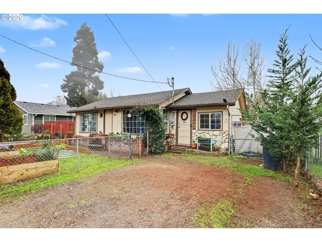 a front view of a house with swimming pool having outdoor seating