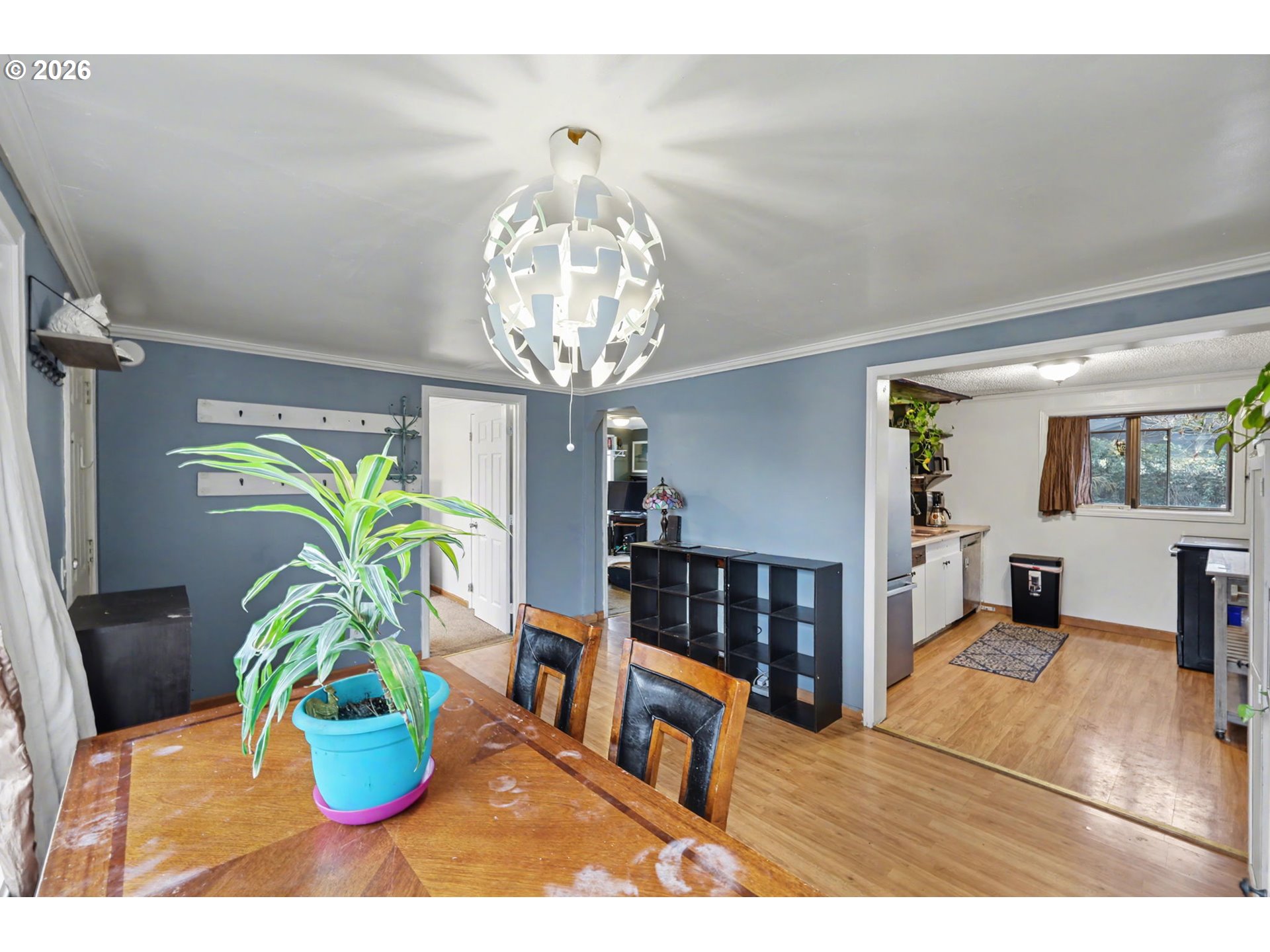 1891 Scott Road Springfield, OR 97477 - Photo 12 of 38 a view of a dining room with furniture and a chandelier