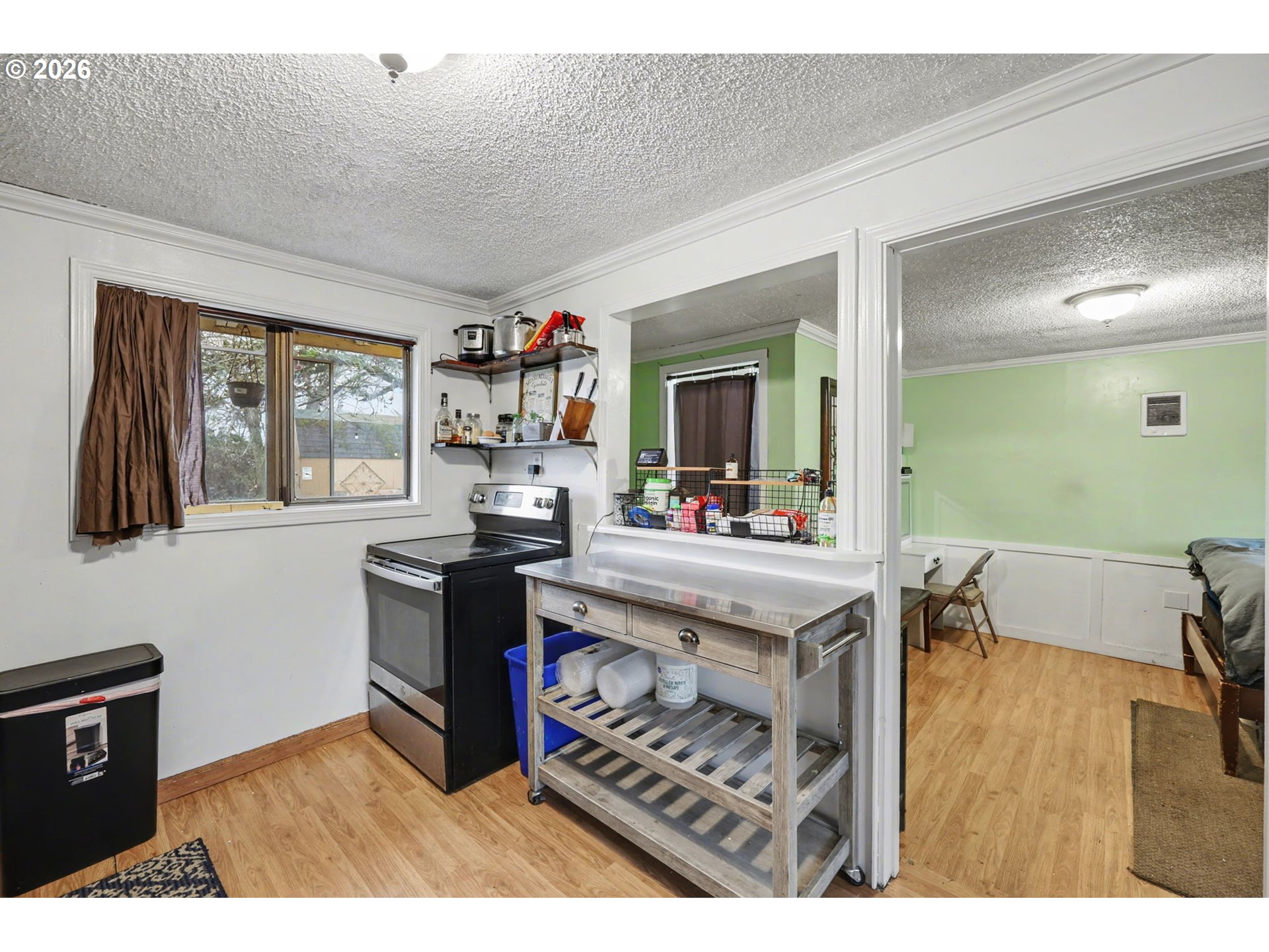 1891 Scott Road Springfield, OR 97477 - Photo 17 of 38 a living room with furniture a flat screen tv and a fireplace