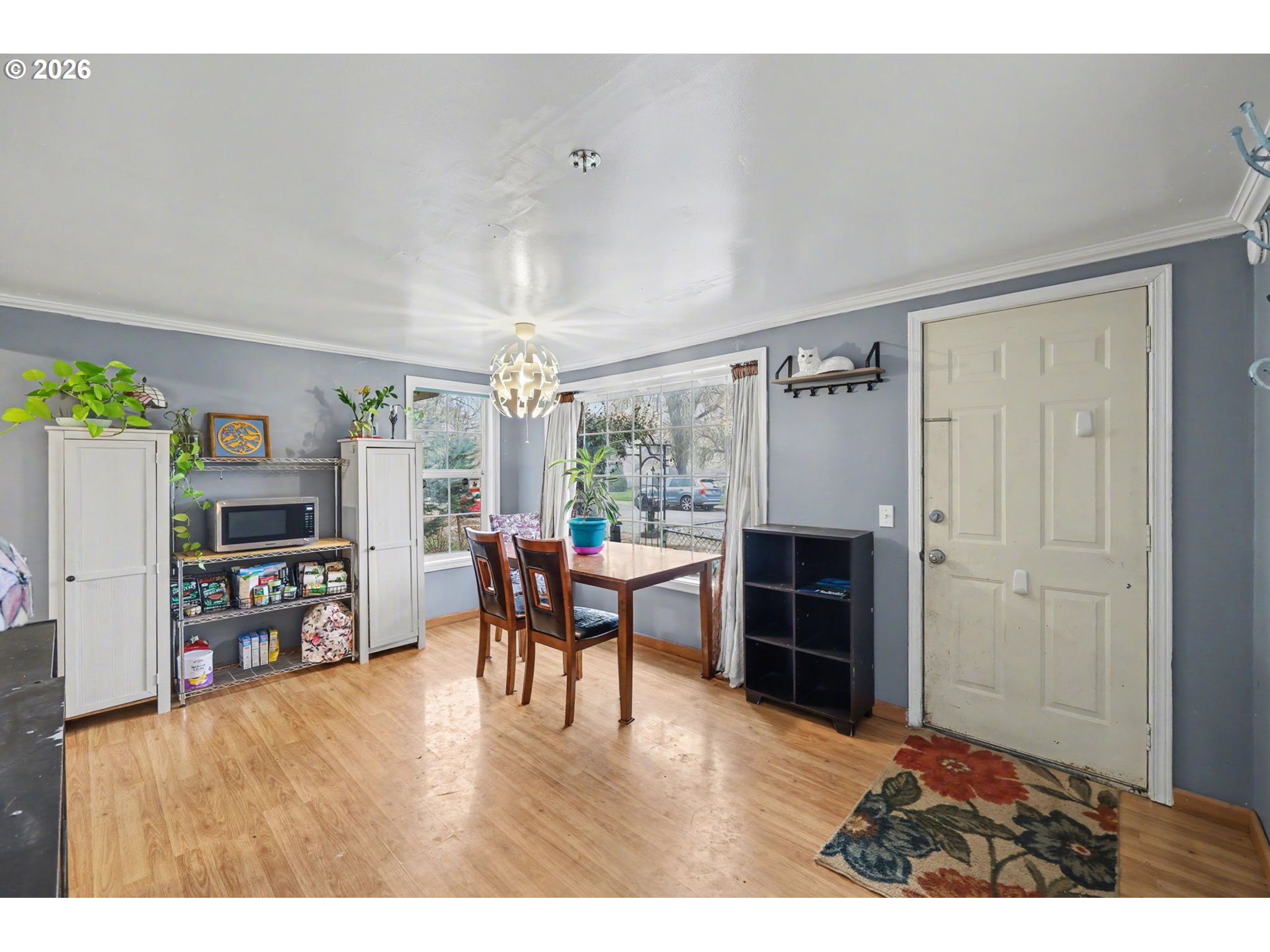 1891 Scott Road Springfield, OR 97477 - Photo 7 of 38 a living room with furniture a fireplace and a window
