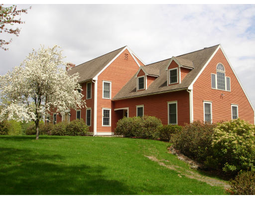 82 Whiley Road Groton, MA 01450 - Photo 1 of 30 a view of front of house with a yard