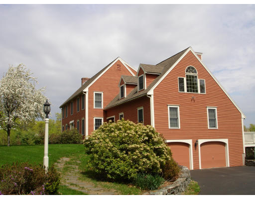 82 Whiley Road Groton, MA 01450 - Photo 2 of 30 a front view of a house with garden