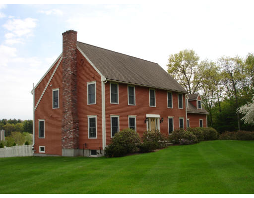 82 Whiley Road Groton, MA 01450 - Photo 26 of 30 a front view of a house with a yard