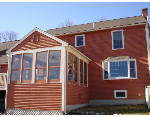 82 Whiley Road Groton, MA 01450 - Photo 3 of 30 a front view of a house with yard