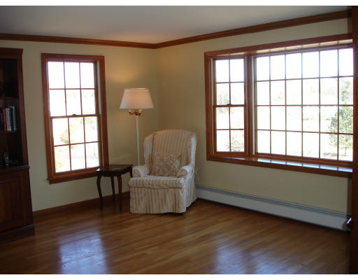 82 Whiley Road Groton, MA 01450 - Photo 8 of 30 a living room with furniture and a window
