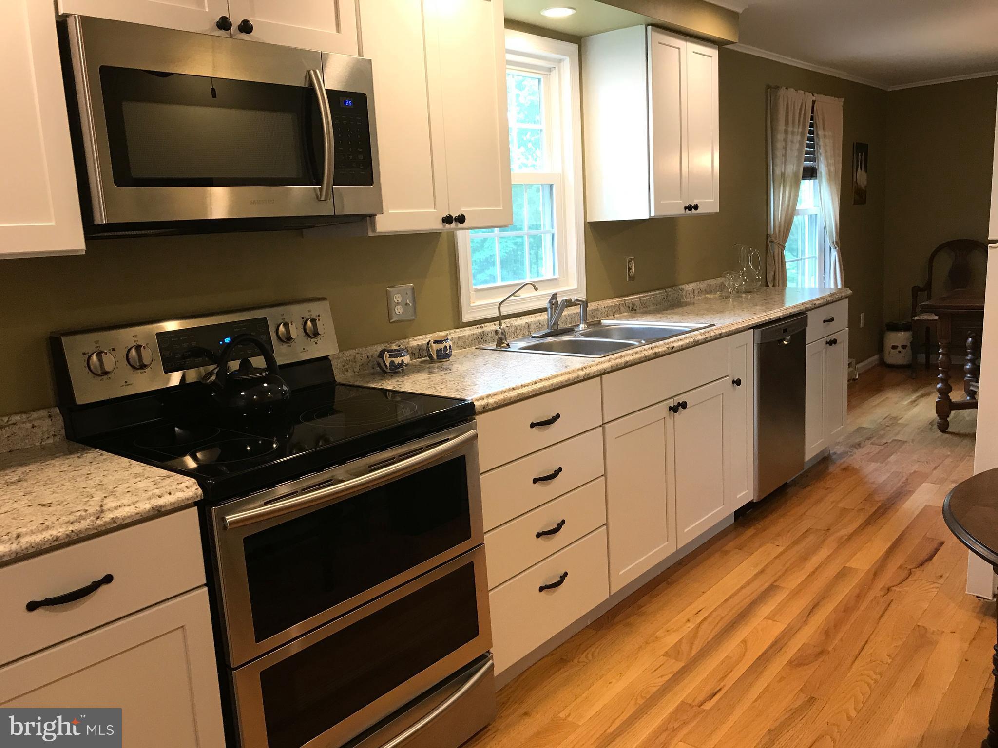 2846 Mauzy Road Berkeley Springs, WV 25411 - Photo 12 of 29 With silent close doors & cabinets