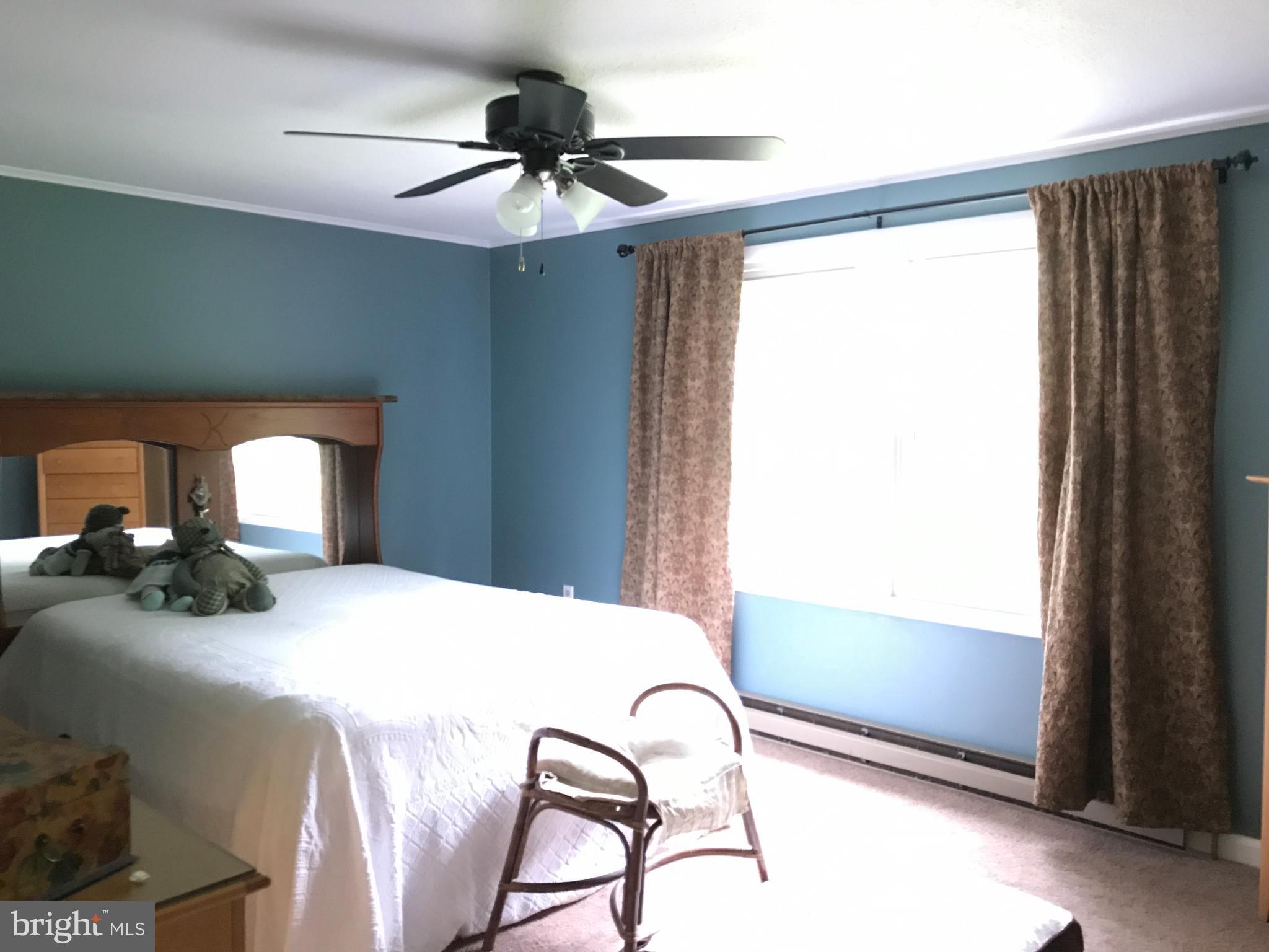 2846 Mauzy Road Berkeley Springs, WV 25411 - Photo 14 of 29 Master Bedroom freshly painted & new carpet.
