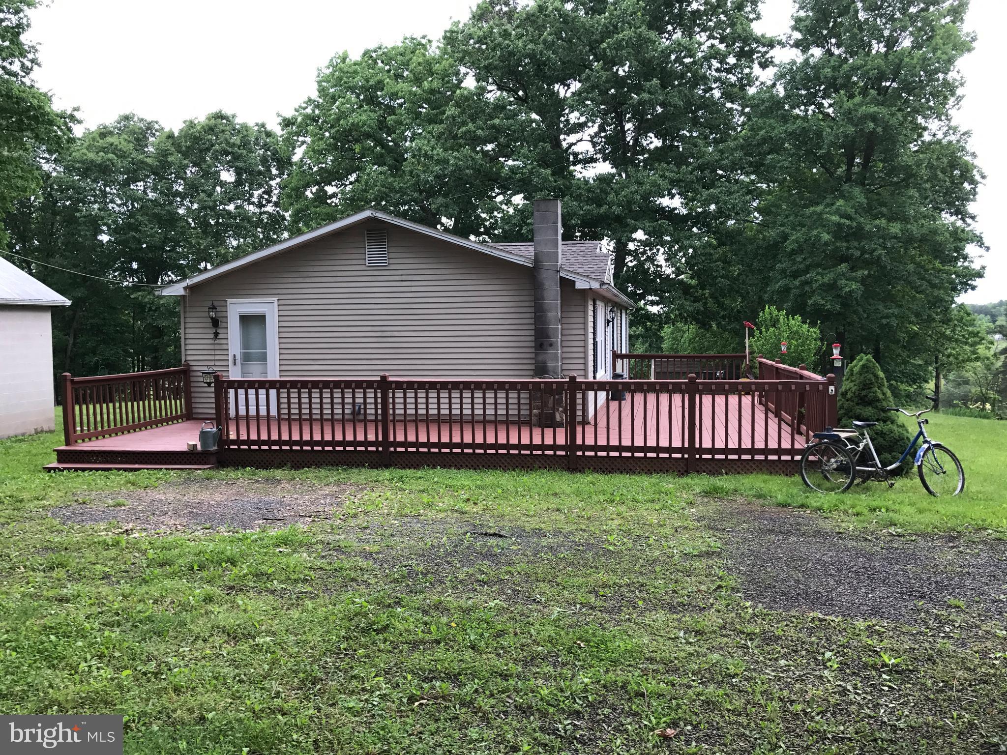 2846 Mauzy Road Berkeley Springs, WV 25411 - Photo 3 of 29 Wrap around deck