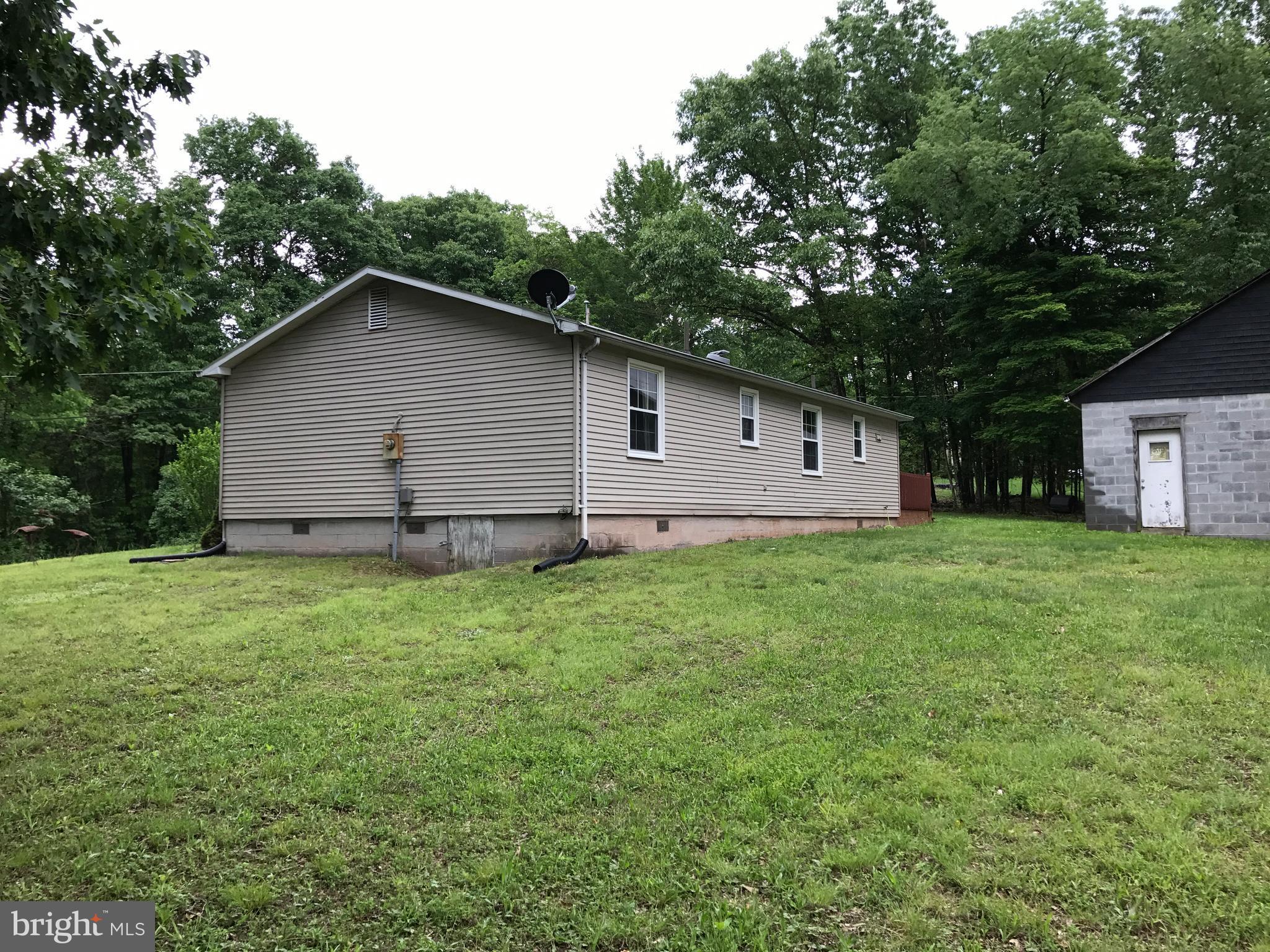 2846 Mauzy Road Berkeley Springs, WV 25411 - Photo 4 of 29 Right side & rear of home