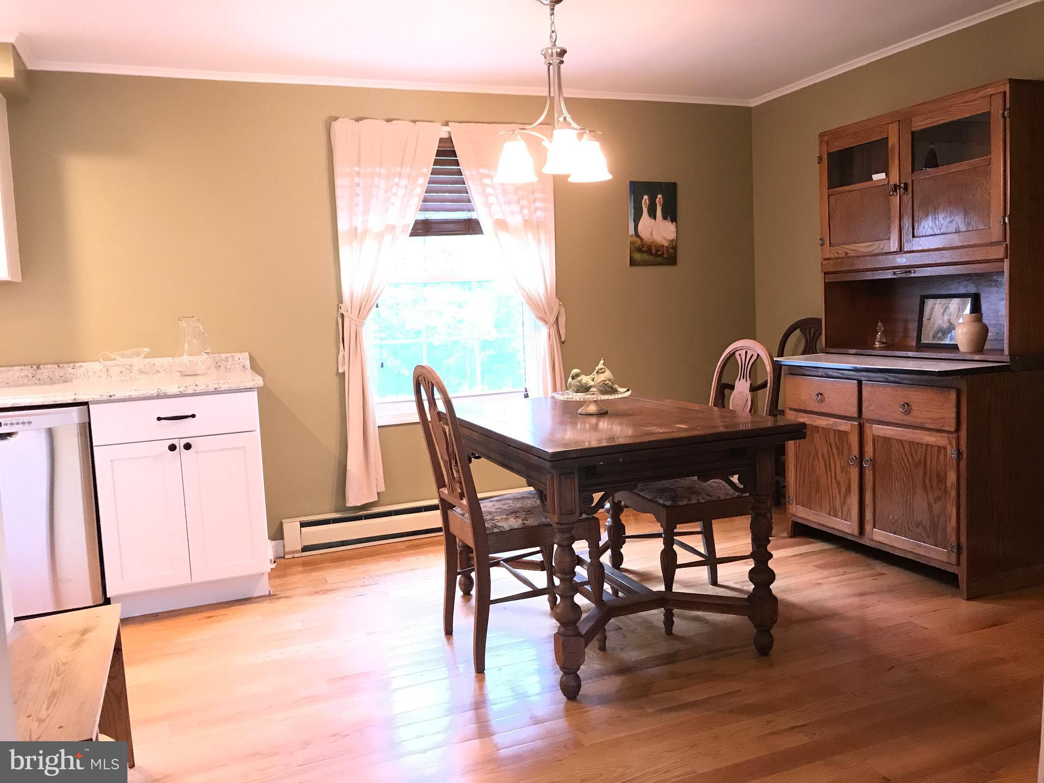 2846 Mauzy Road Berkeley Springs, WV 25411 - Photo 8 of 29 Oak hardwood floors & 2" wood blinds.