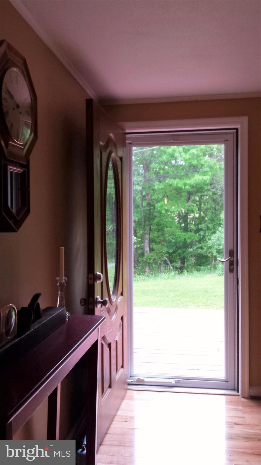 2846 Mauzy Road Berkeley Springs, WV 25411 - Photo 10 of 29 View from Dining Room to open front door.