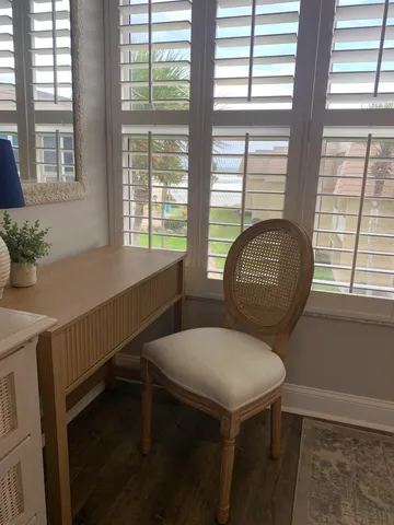 a view of a livingroom with an empty space and window