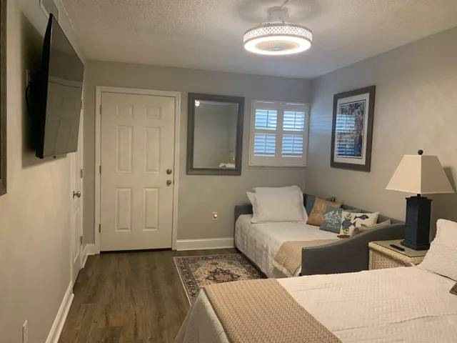a bathroom with a shower and a shower head