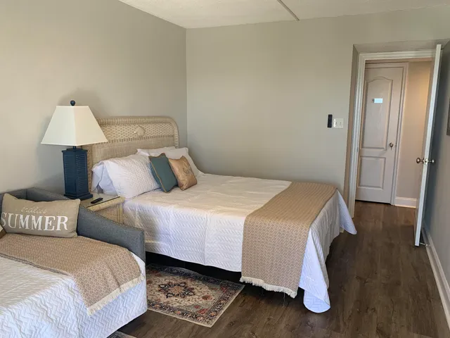 a view of a swimming pool with lounge chairs