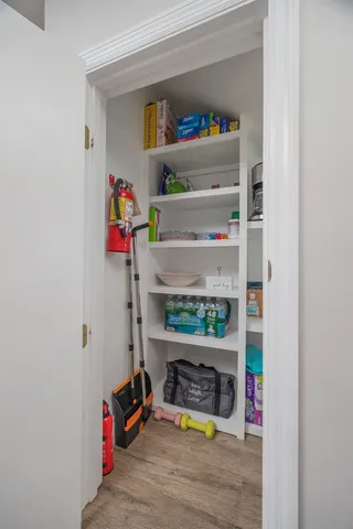 a view of a swimming pool with a yard