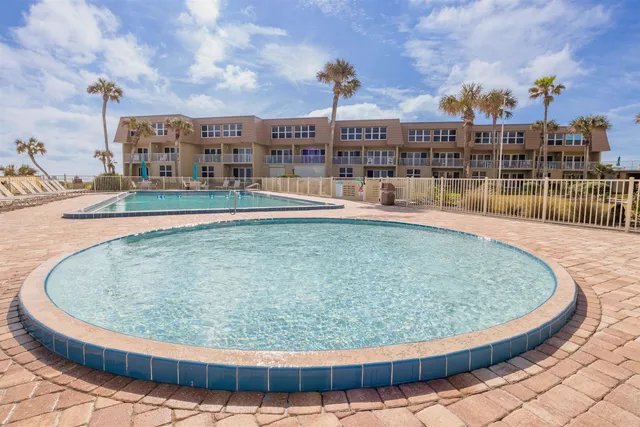 a vase of flowers sitting on a table
