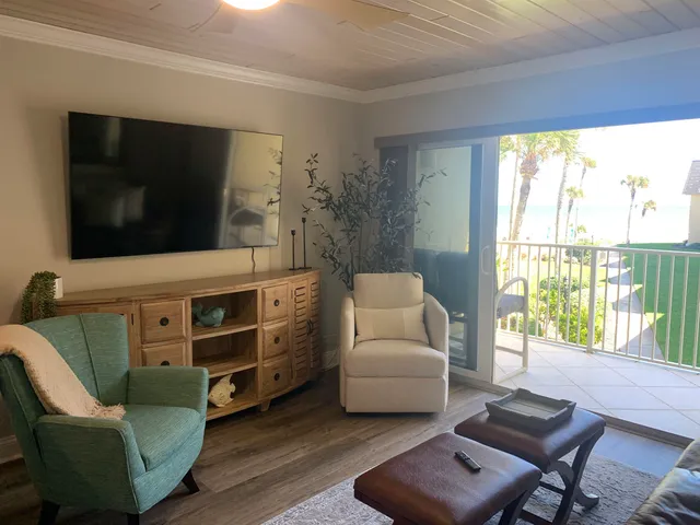 a view of balcony with furniture