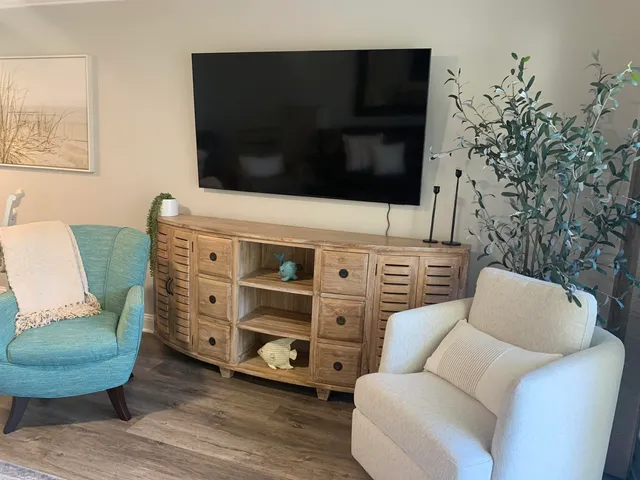 a view of a brick house with a balcony