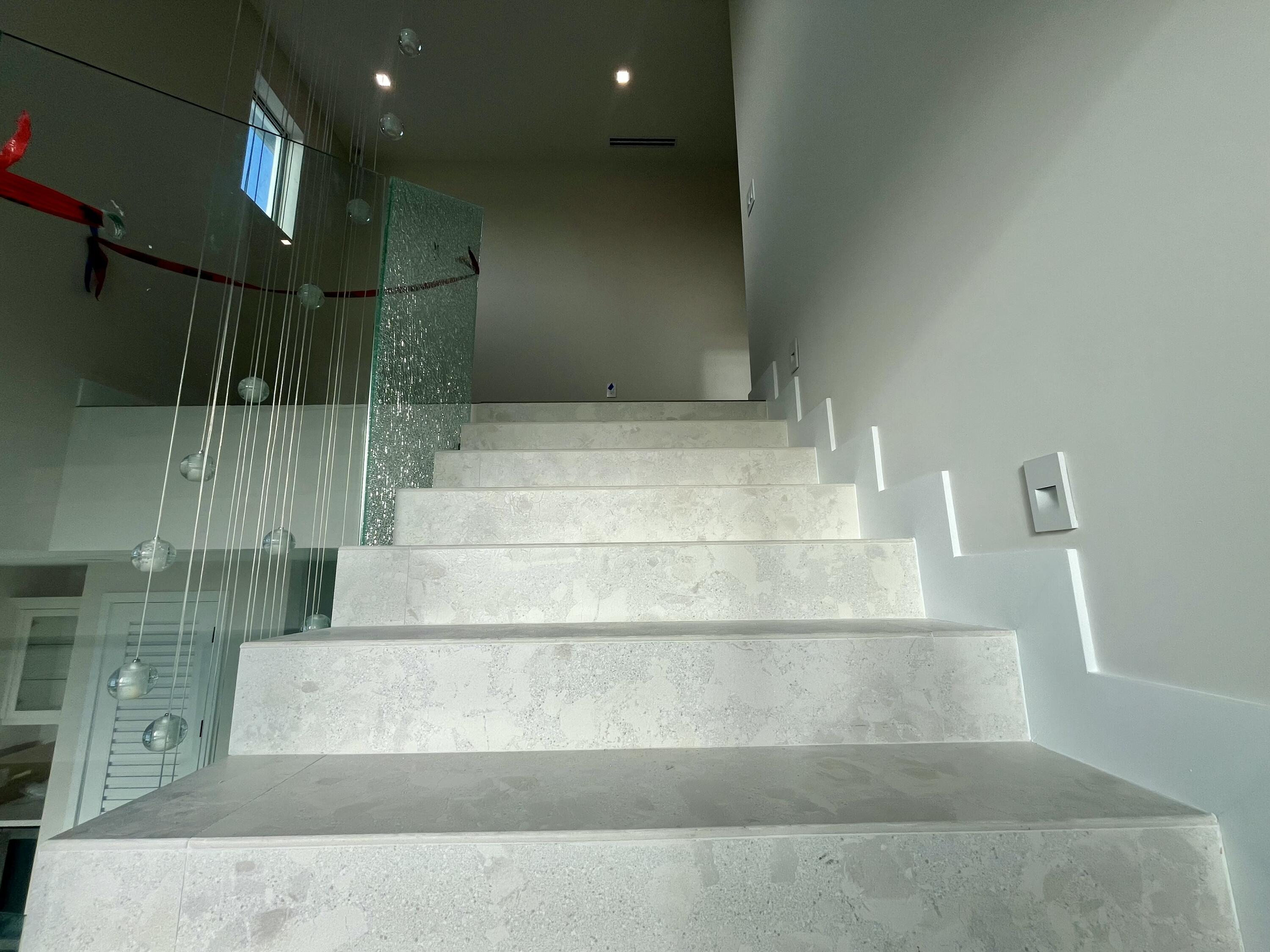 128 Sunrise Drive Marathon, FL 33050 - Photo 11 of 40 a view of staircase with white walls