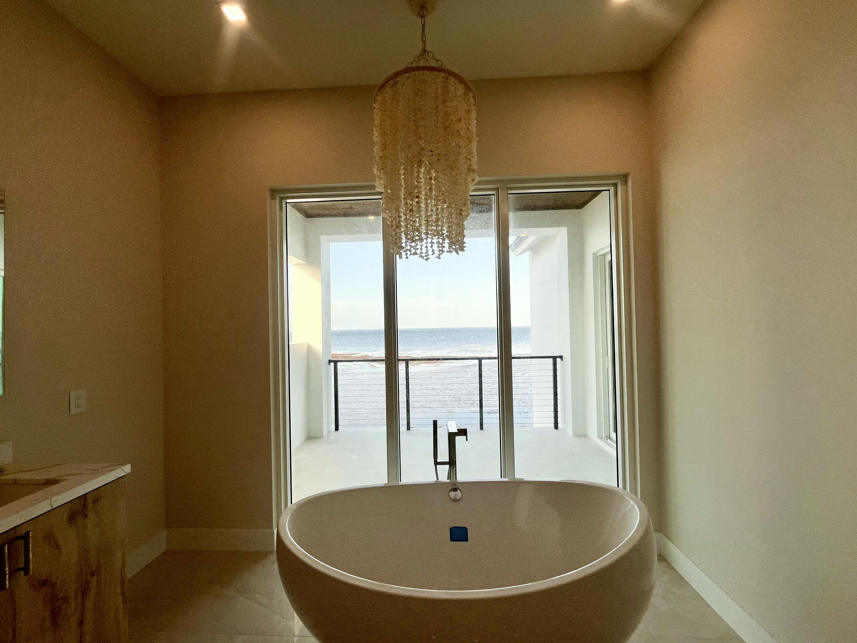 128 Sunrise Drive Marathon, FL 33050 - Photo 24 of 40 a bathroom with a tub and shower