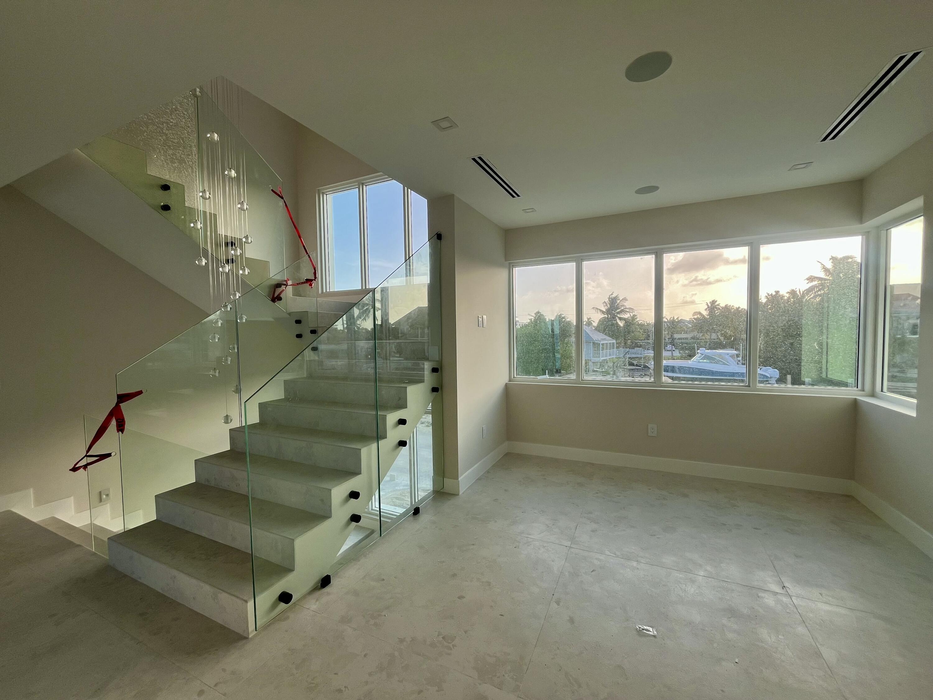 128 Sunrise Drive Marathon, FL 33050 - Photo 6 of 40 a view of entryway and hall with wooden floor