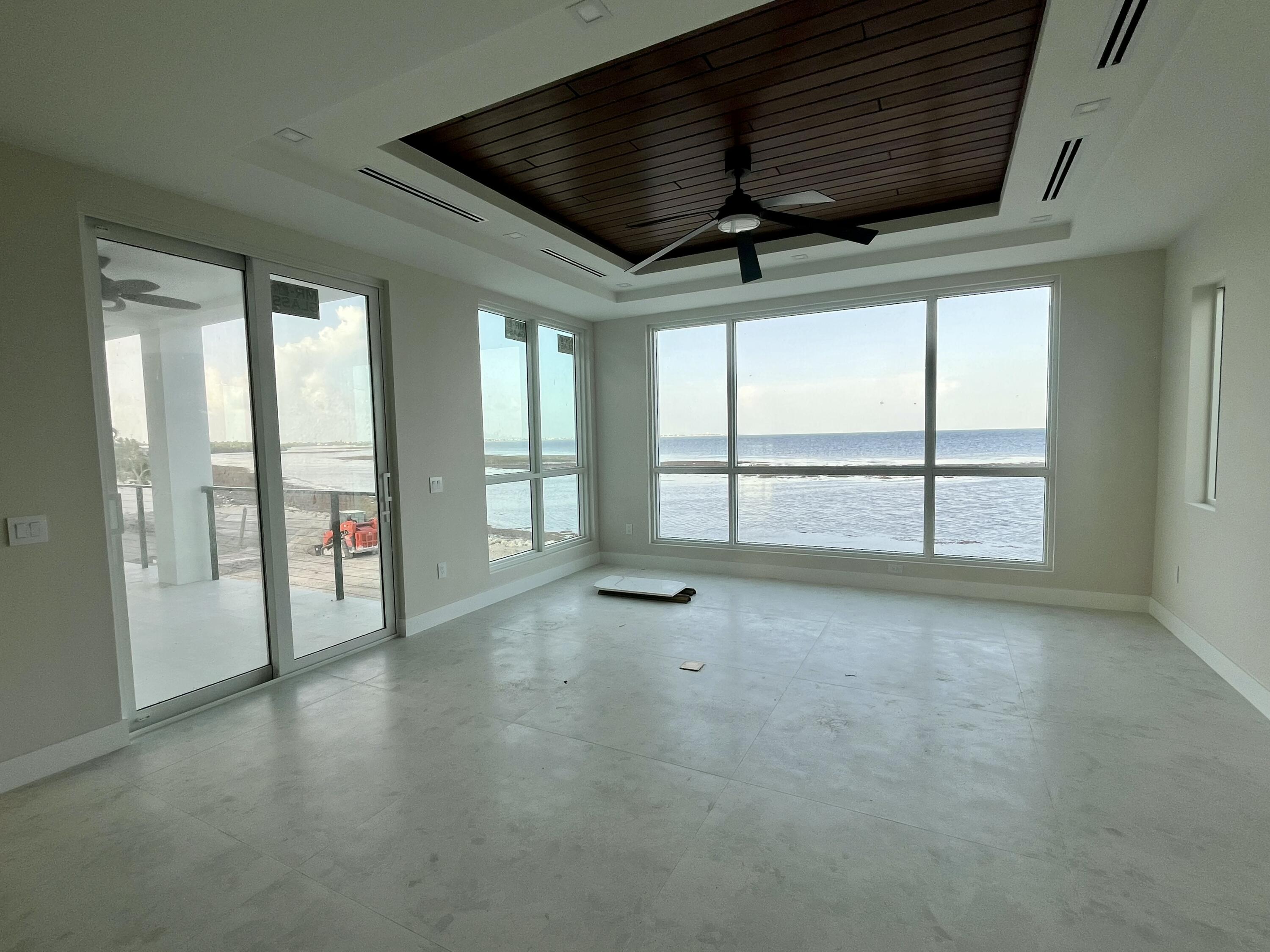 128 Sunrise Drive Marathon, FL 33050 - Photo 9 of 40 a view of an empty room with a window