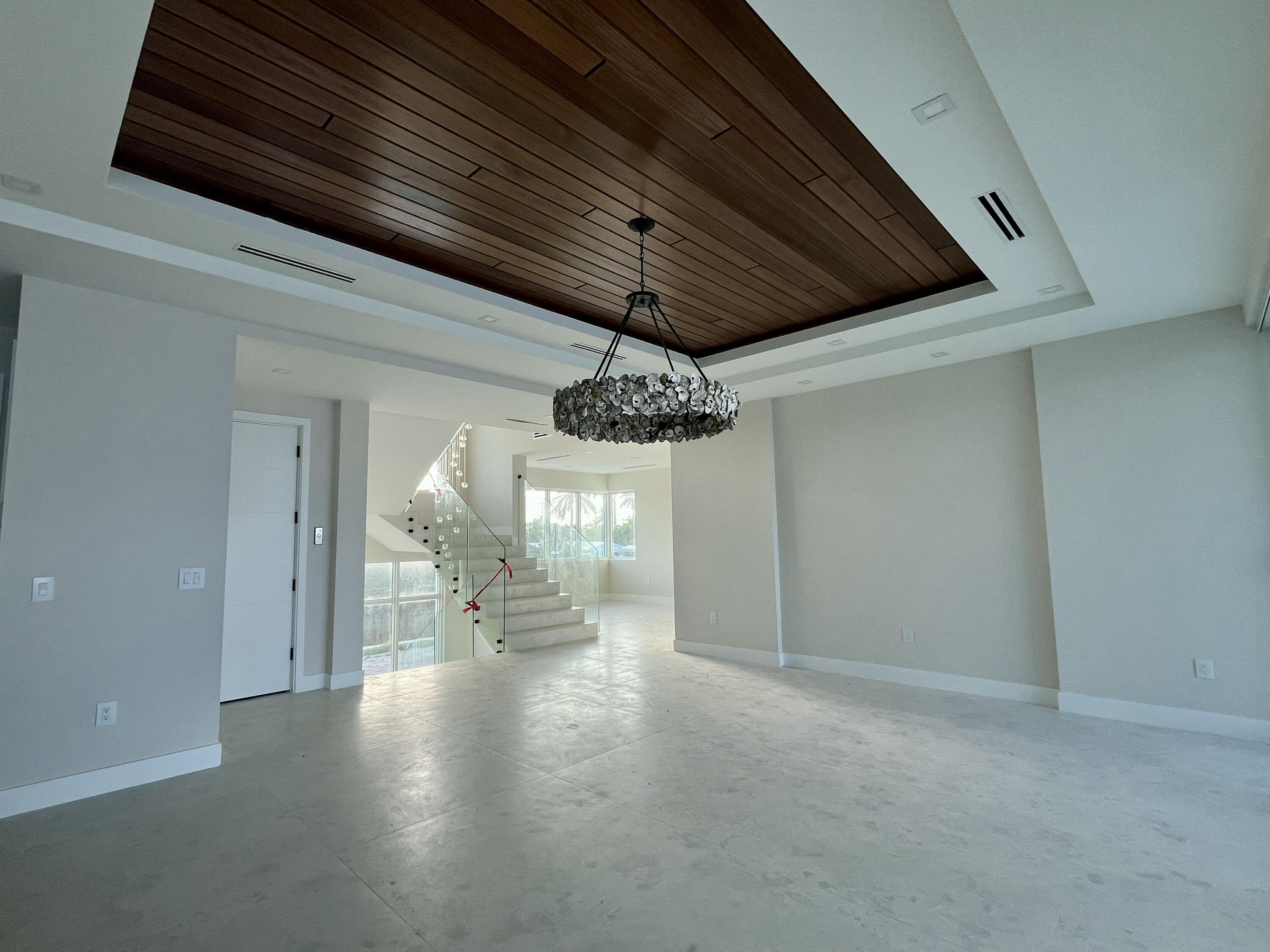 128 Sunrise Drive Marathon, FL 33050 - Photo 10 of 40 a view of a livingroom with a chandelier