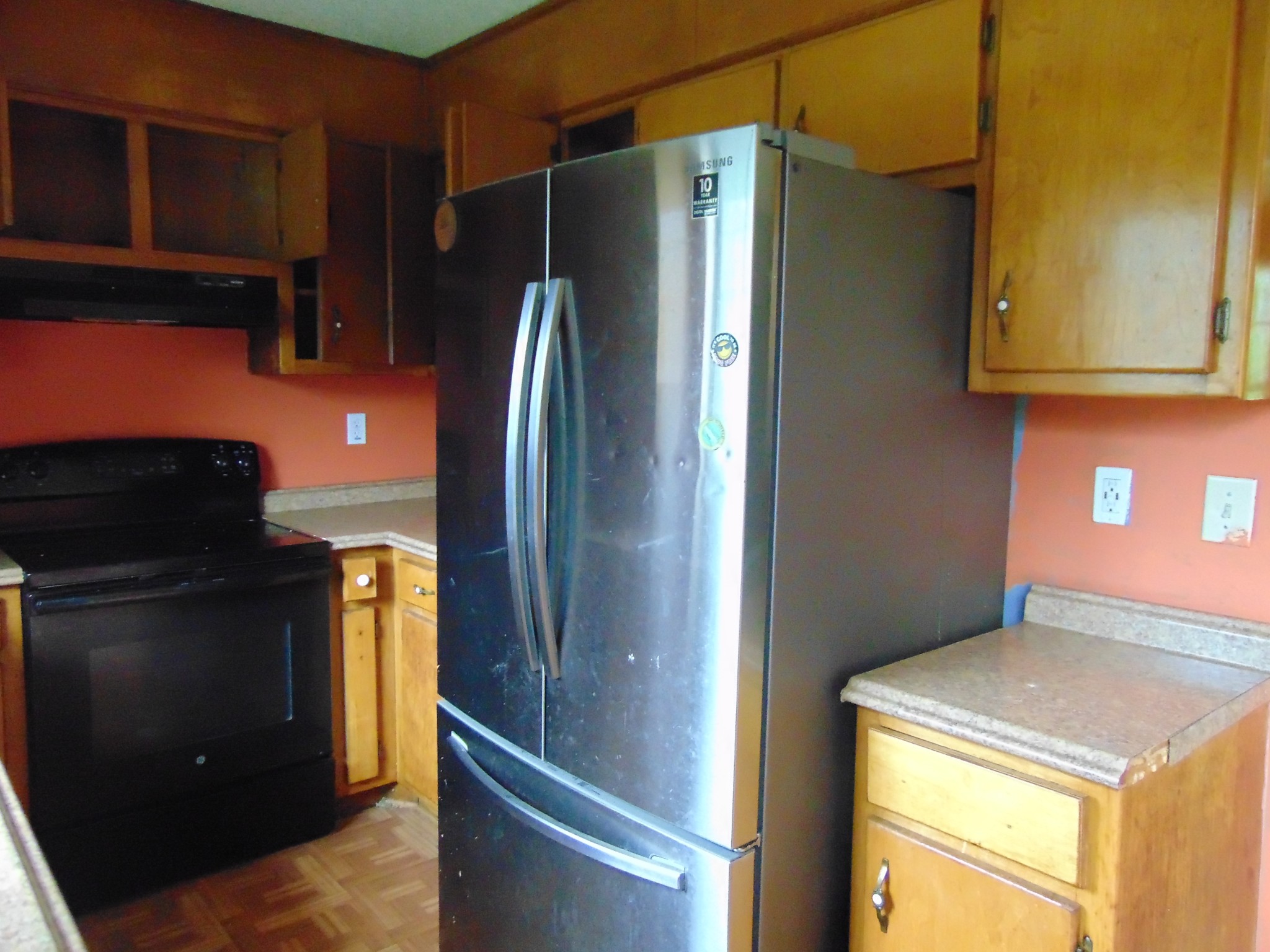 211 Wilson Street Winchester, TN 37398 - Photo 11 of 18 a kitchen with a refrigerator and a stove