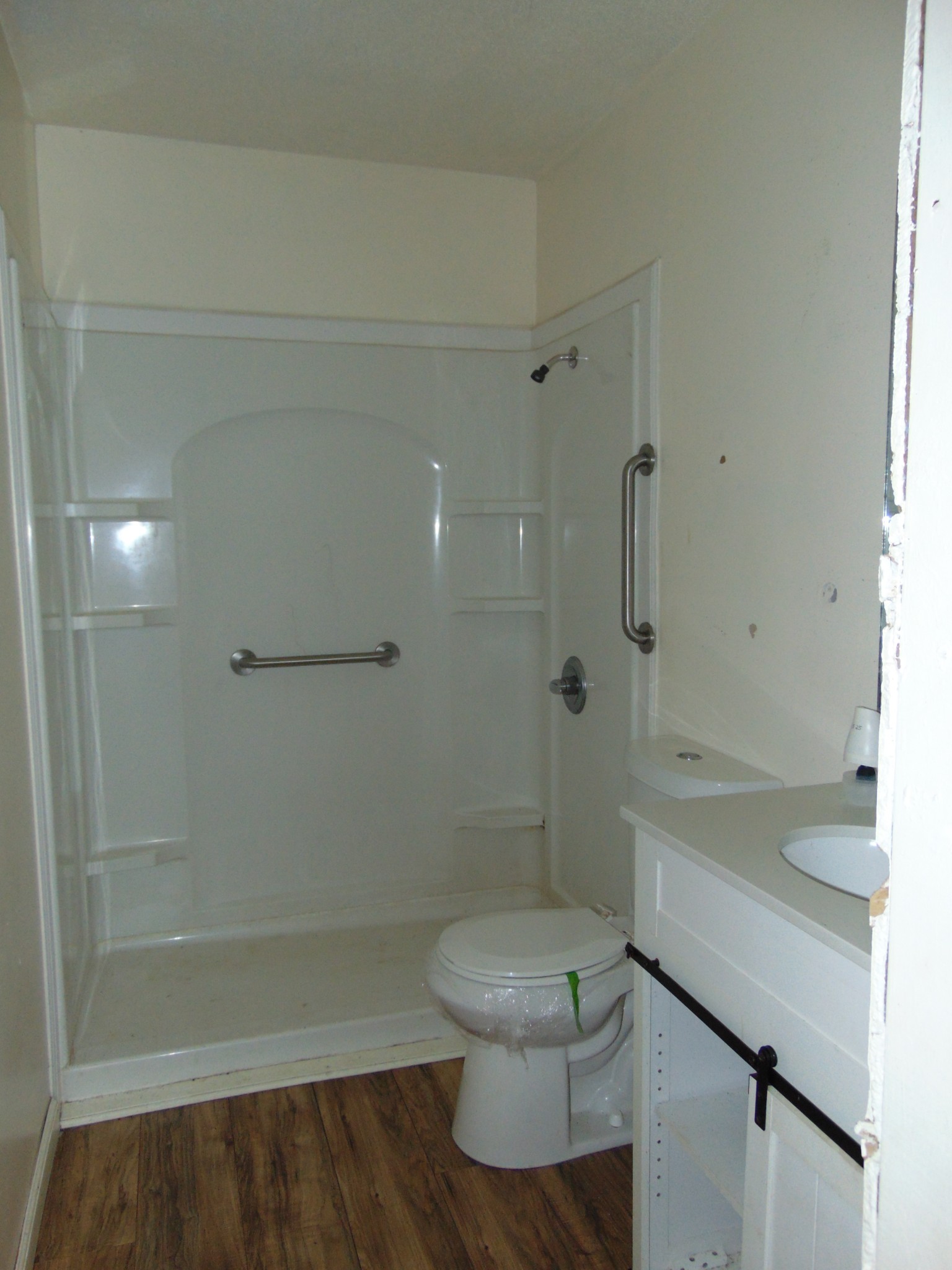 211 Wilson Street Winchester, TN 37398 - Photo 16 of 18 a bathroom with a sink a toilet and shower