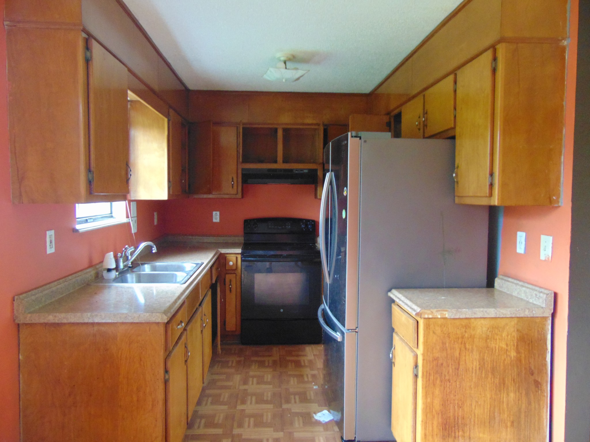 211 Wilson Street Winchester, TN 37398 - Photo 10 of 18 a bathroom with a sink a mirror and a shower