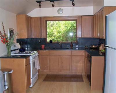 3980 Montecito Avenue Santa Rosa, CA 95404 - Photo 3 of 6 a kitchen with a stove a sink and a refrigerator